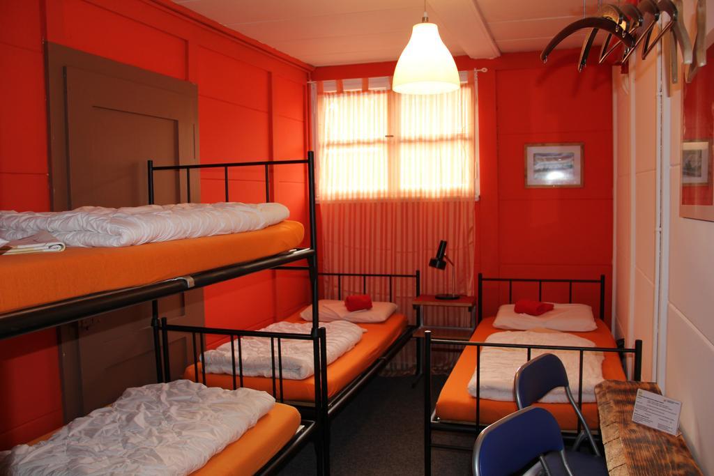 גרינדלוולד Downtown Lodge Hostel - Unique Simple Central חדר תמונה